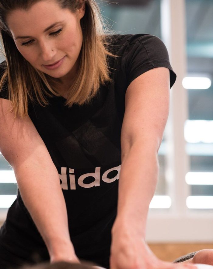 Clare massaging a client